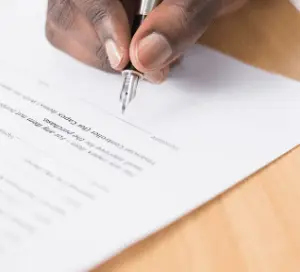 Man signing contract