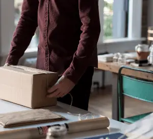 Man packing a box